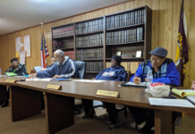 Colony talks debt repayment, summer food program