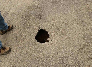 Arkadelphia residents find sinkhole forming under road