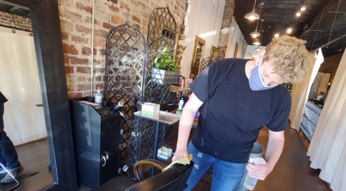 Local salons, barbers cautiously reopening