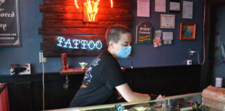 Local tattoo parlors following, establishing health guidelines for customers