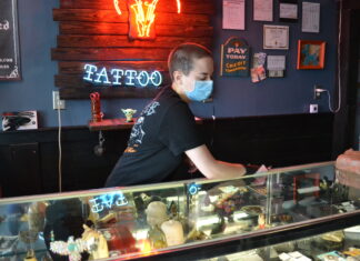 Local tattoo parlors following, establishing health guidelines for customers