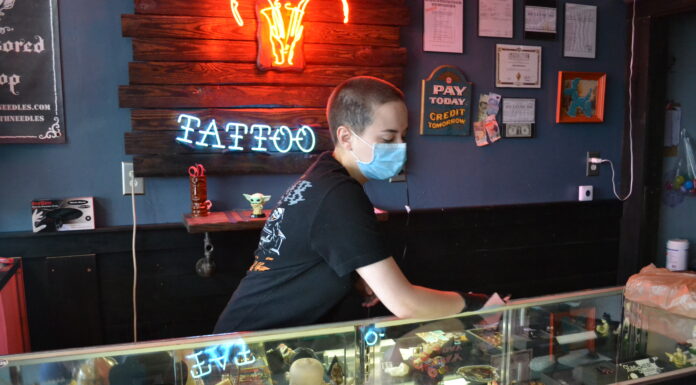 Local tattoo parlors following, establishing health guidelines for customers