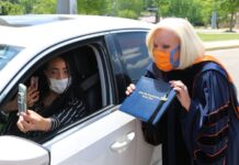 Wallace State President Dr. Vicki Karolewics awards diploma via FaceTime during drive-thru graduation celebration