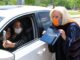 Wallace State President Dr. Vicki Karolewics awards diploma via FaceTime during drive-thru graduation celebration