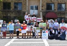 Sacred Heart School sends off students with drive-thru parade