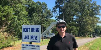 ‘Don’t drink and drive’: Signs near grounds of Friday’s Alan Jackson concert honor memory of Curt Wilson