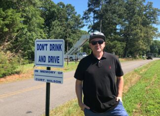 ‘Don’t drink and drive’: Signs near grounds of Friday’s Alan Jackson concert honor memory of Curt Wilson