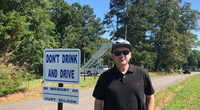 ‘Don’t drink and drive’: Signs near grounds of Friday’s Alan Jackson concert honor memory of Curt Wilson