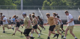 PREP FOOTBALL: Local teams kick off summer workouts
