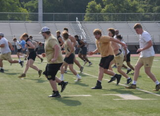PREP FOOTBALL: Local teams kick off summer workouts