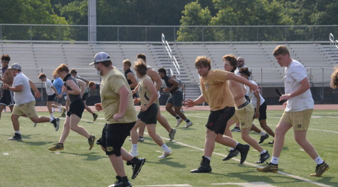 PREP FOOTBALL: Local teams kick off summer workouts