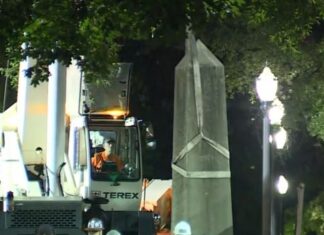 (Updated) Cullman demolition company helps dismantle Confederate monument in Birmingham