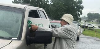 Helping hands: Weekly distribution of food boxes for area senior citizens resumes