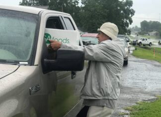 Helping hands: Weekly distribution of food boxes for area senior citizens resumes