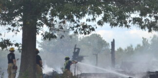 Abandoned house burns near south Wal-Mart