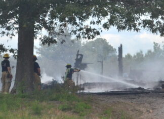 Abandoned house burns near south Wal-Mart