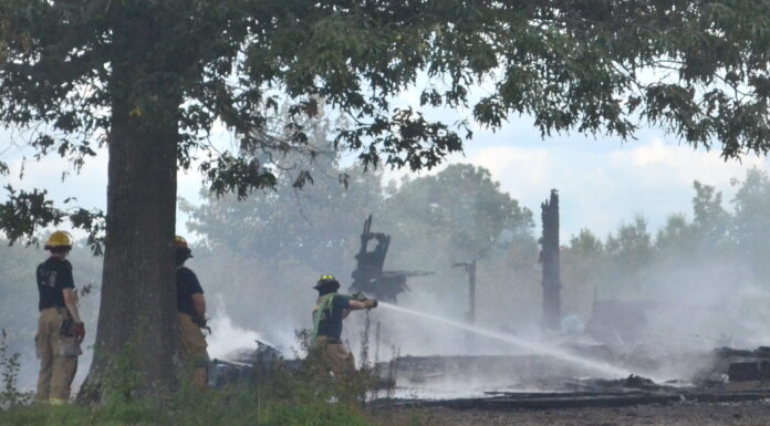 Abandoned house burns near south Wal-Mart
