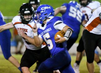 PREP FOOTBALL: Cold Springs holds off weather, Meek to win season opener 43-40