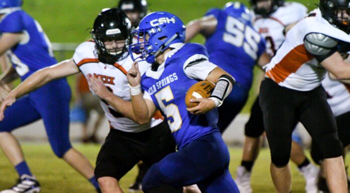 PREP FOOTBALL: Cold Springs holds off weather, Meek to win season opener 43-40