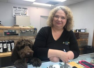 The Man in Brown: Johnny ‘Cash’ Collins delights customers at his owners’ store