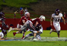 PREP FOOTBALL: Battle in the Swamp: Raiders put game away late, 31-14