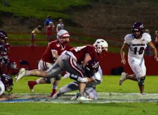 PREP FOOTBALL: Battle in the Swamp: Raiders put game away late, 31-14