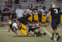 PREP FOOTBALL: ‘Cats maul Bucks 20-0 to improve to 4-0