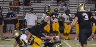 PREP FOOTBALL: ‘Cats maul Bucks 20-0 to improve to 4-0