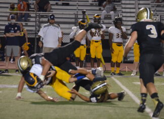 PREP FOOTBALL: ‘Cats maul Bucks 20-0 to improve to 4-0