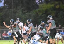 PREP FOOTBALL: Tigers upend Broncos, 56-8