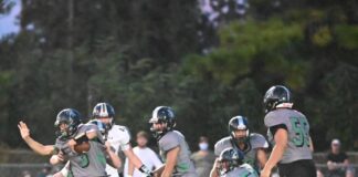 PREP FOOTBALL: Tigers upend Broncos, 56-8