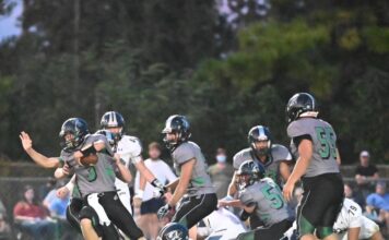 PREP FOOTBALL: Tigers upend Broncos, 56-8