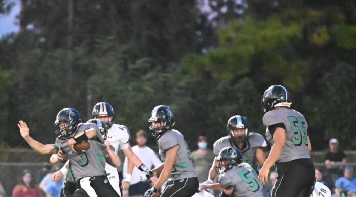 PREP FOOTBALL: Tigers upend Broncos, 56-8