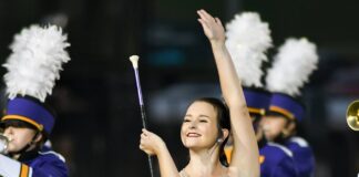 Fairview majorette shares special moment with young fan