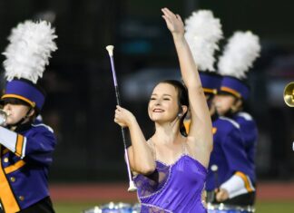 Fairview majorette shares special moment with young fan