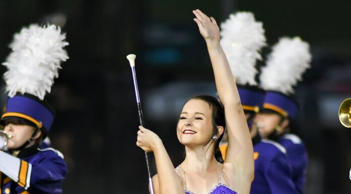 Fairview majorette shares special moment with young fan