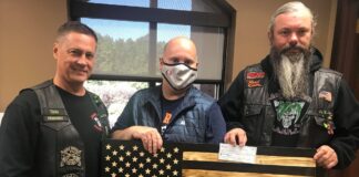 Jack Aces RC donates more than $11K to Shop with a Cop program