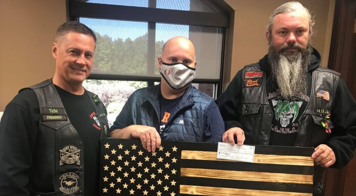 Jack Aces RC donates more than $11K to Shop with a Cop program