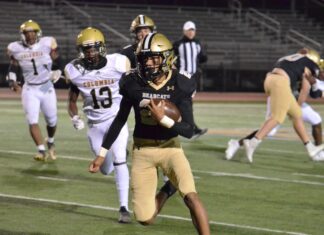 PREP FOOTBALL: ‘Cats maul Columbia 40-6 in regular season finale