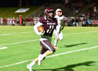 PREP FOOTBALL: Warriors punch playoff ticket in 49-0 blowout