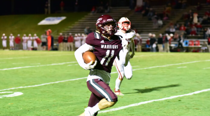 PREP FOOTBALL: Warriors punch playoff ticket in 49-0 blowout