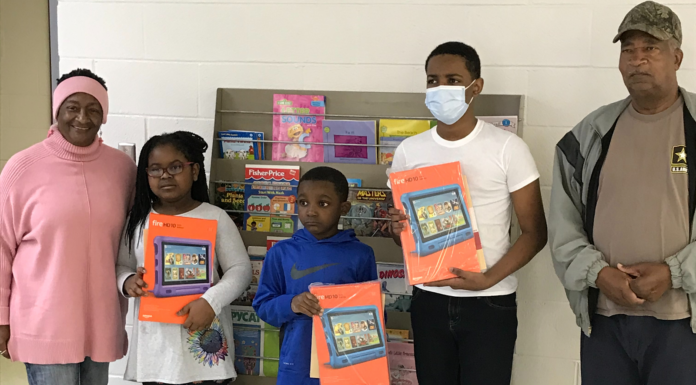 Colony gives tablets to students in community tutoring program