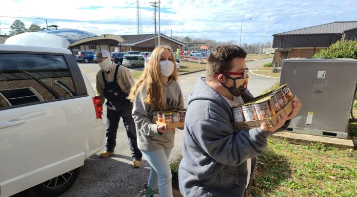 CATA students box up food, love, compassion for families in need