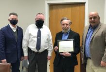 Commission honors retirees; CR 1301 to be resurfaced