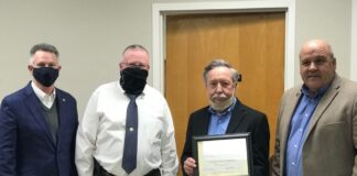 Commission honors retirees; CR 1301 to be resurfaced