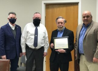 Commission honors retirees; CR 1301 to be resurfaced