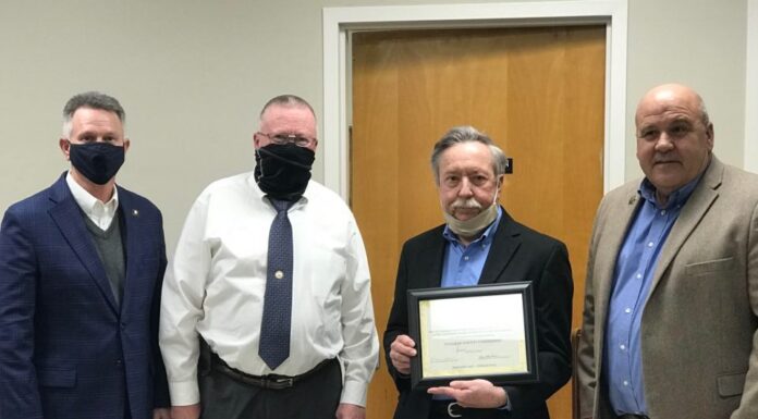 Commission honors retirees; CR 1301 to be resurfaced