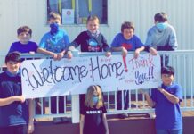 CCCDC student welcomes dad home from Air Force with the help of classmates