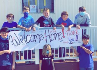 CCCDC student welcomes dad home from Air Force with the help of classmates