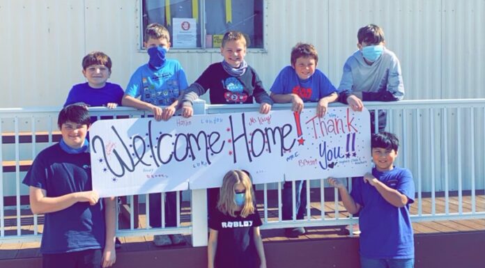 CCCDC student welcomes dad home from Air Force with the help of classmates